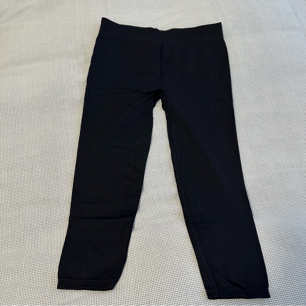 Like new! Bebe Black Knee-Length Stretch Leggings Size P/S